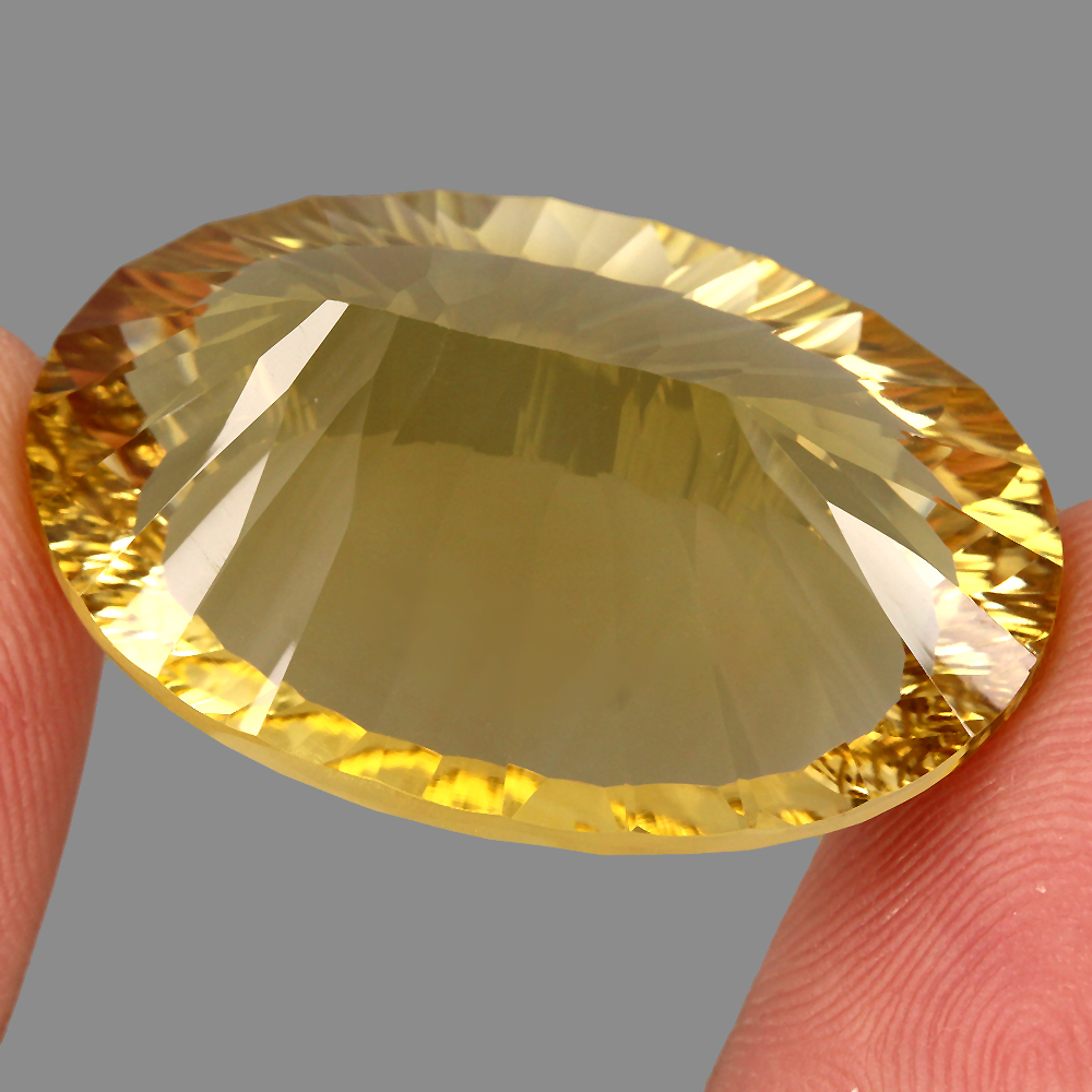 Jumbo Size Very Clean 57.48ct. 32x22mm Oval Concave Cut Natural Yellow ...
